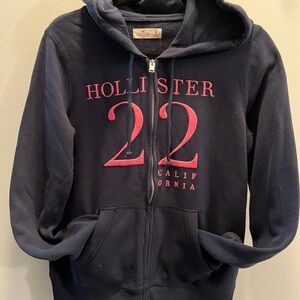 NWT Women’s Hollister Navy Full zip Hoodie with Pink Logo